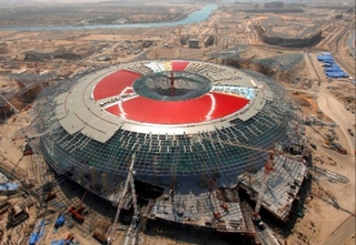 Illustration for article titled Time-Lapse Gallery Of Abu Dhabi's Nearly-Completed Ferrari World Theme Park
